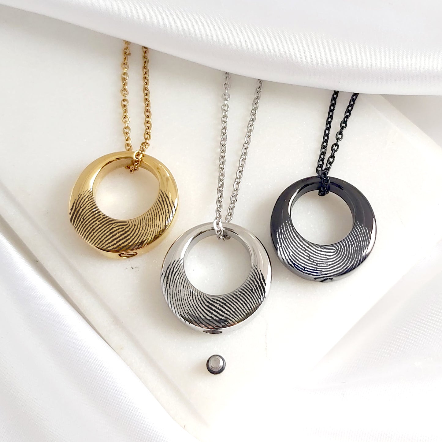Custom thumbprint Infinity urn necklace for human ashes.