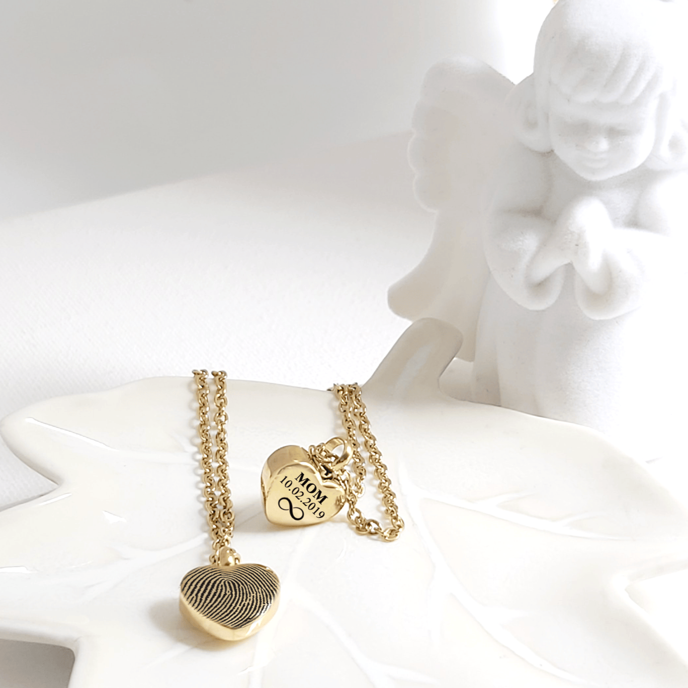 Personalized thumbprint heart urn necklace for human ashes. - mobimomentos