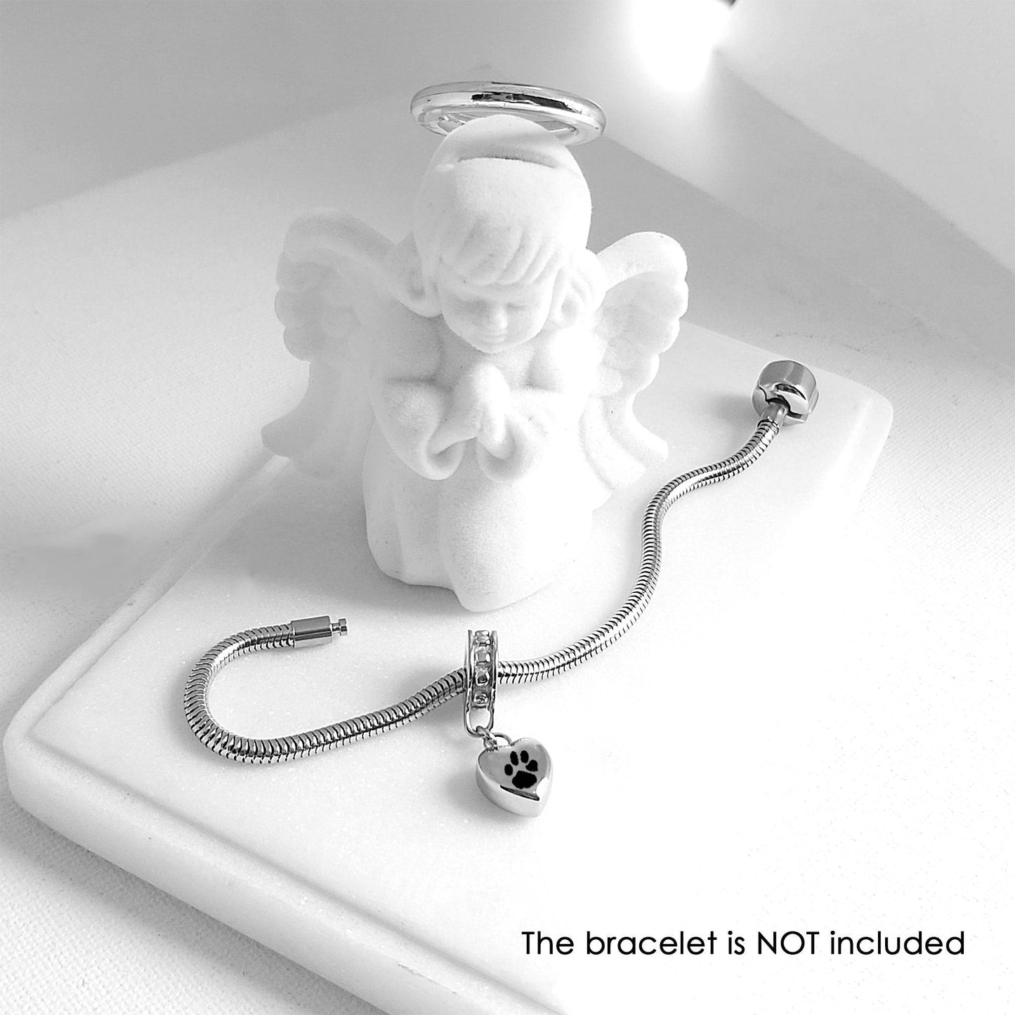 Your pet paw print dangling heart urn charm for bracelet for ashes. - mobimomentos