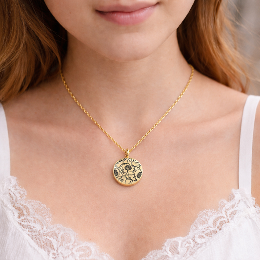 Custom engraved locket with birth flower for woman.