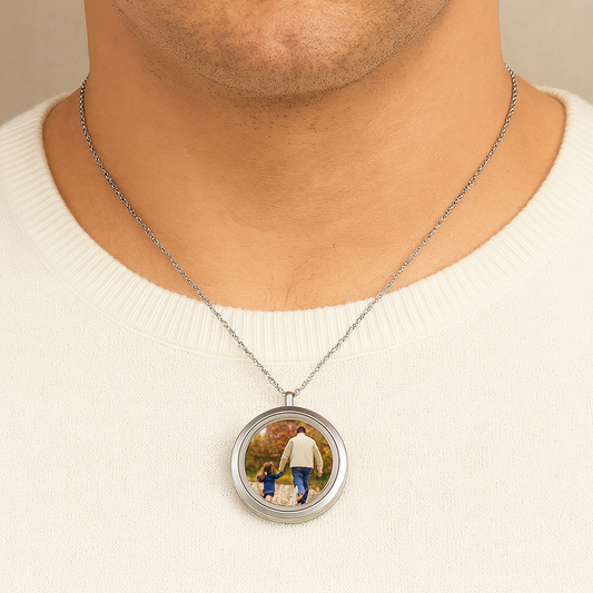 Pet paw print memorial locket with photos and urn for ashes.