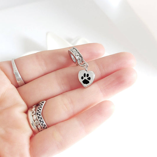 Your pet paw print dangling heart urn charm for bracelet for ashes. - mobimomentos