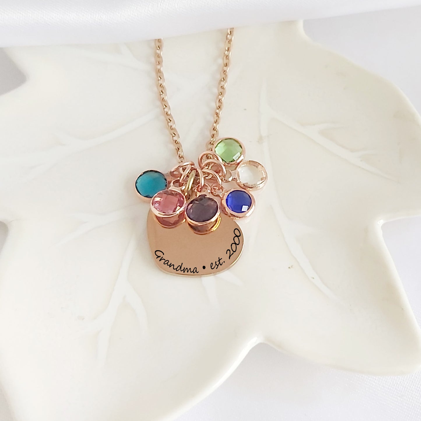 Grandma and mom heart necklace with kids birthstones.