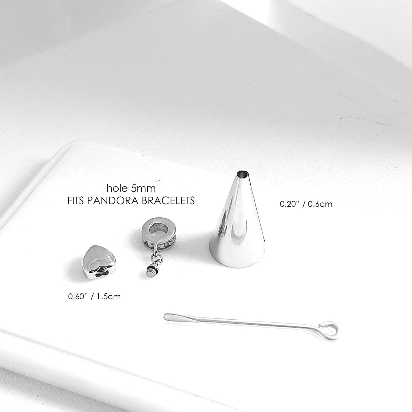Your pet paw print dangling heart urn charm for bracelet for ashes. - mobimomentos