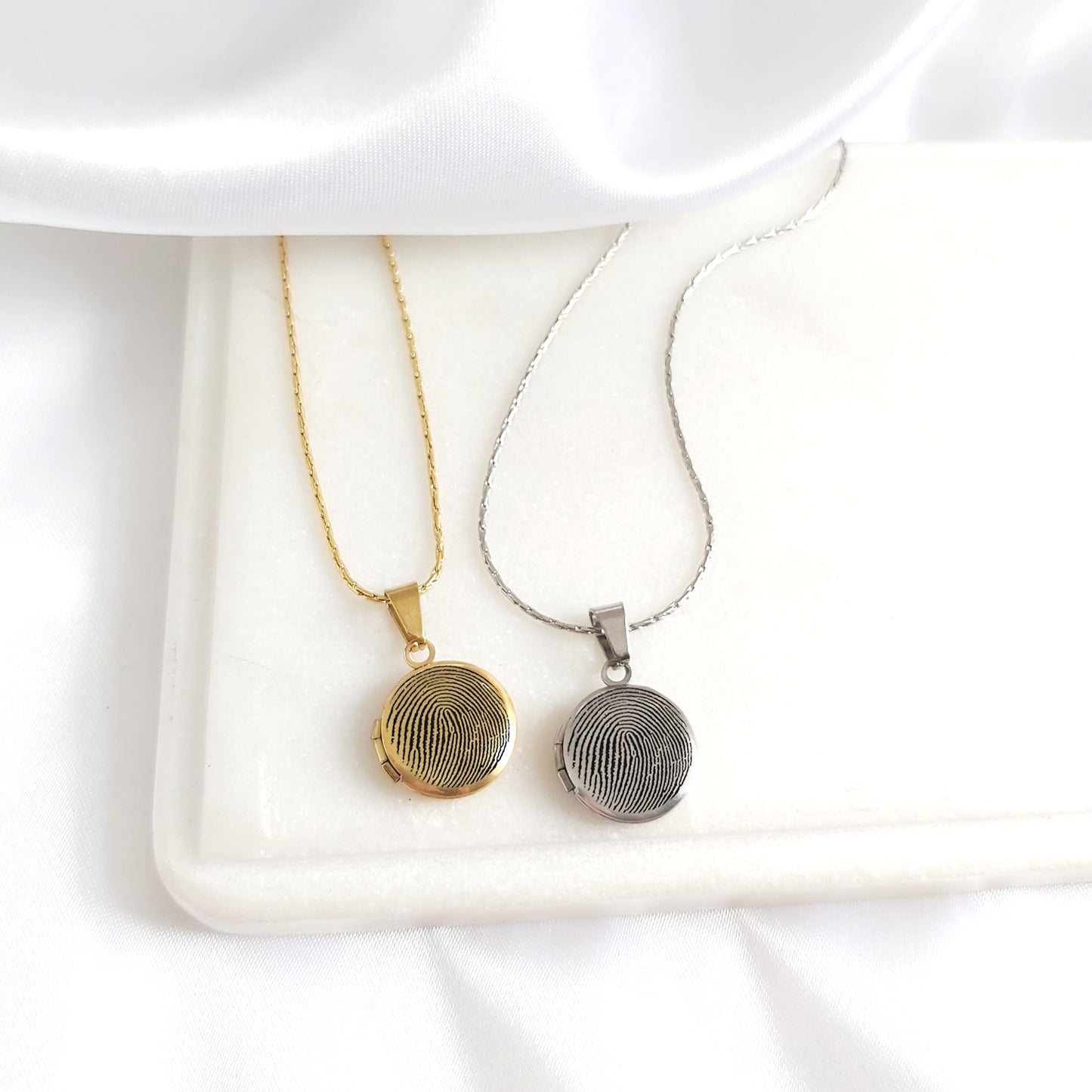 Memorial thumbprint mini locket with photos and engraving.