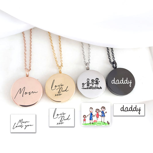 Locket engraved with kids drawings.