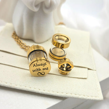 Personalized urn necklace for human ashes or hair.