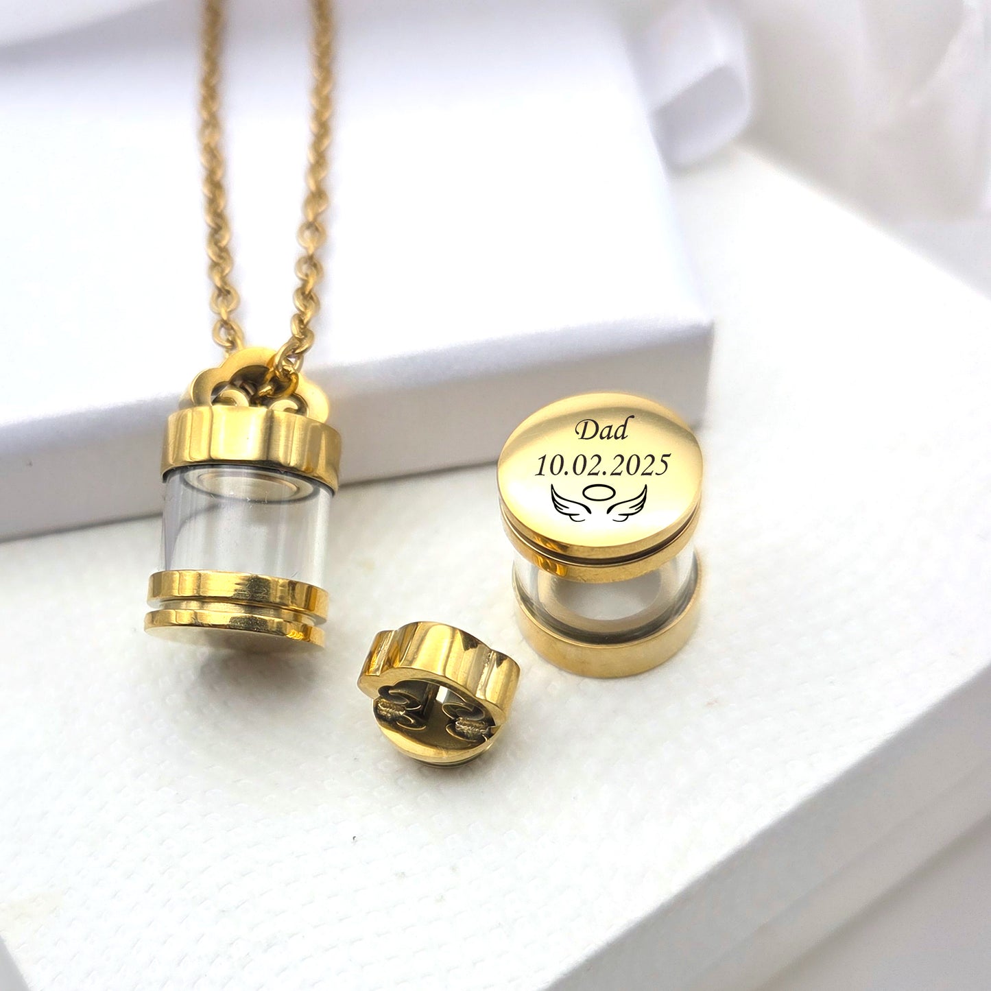 Personalized urn necklace for human ashes or hair.
