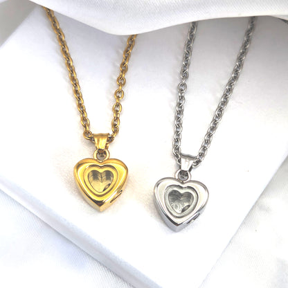 Custom handwriting heart urn necklace for human ashes or hair.
