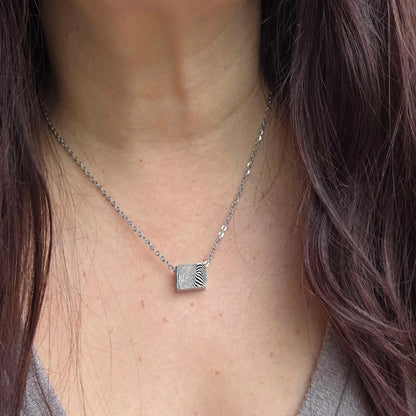 Rectangle thumbprint urn necklace for human ashes.