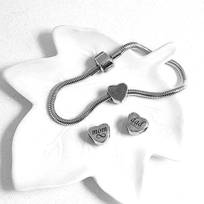 Engraved thumbprint heart charm for bracelet.