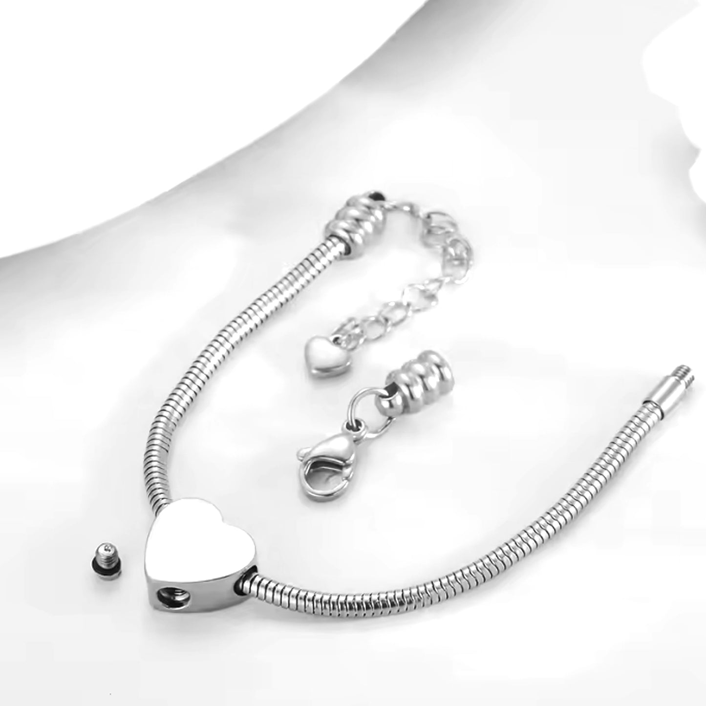 Engraved cremation heart urn charm for bracelet for ashes.