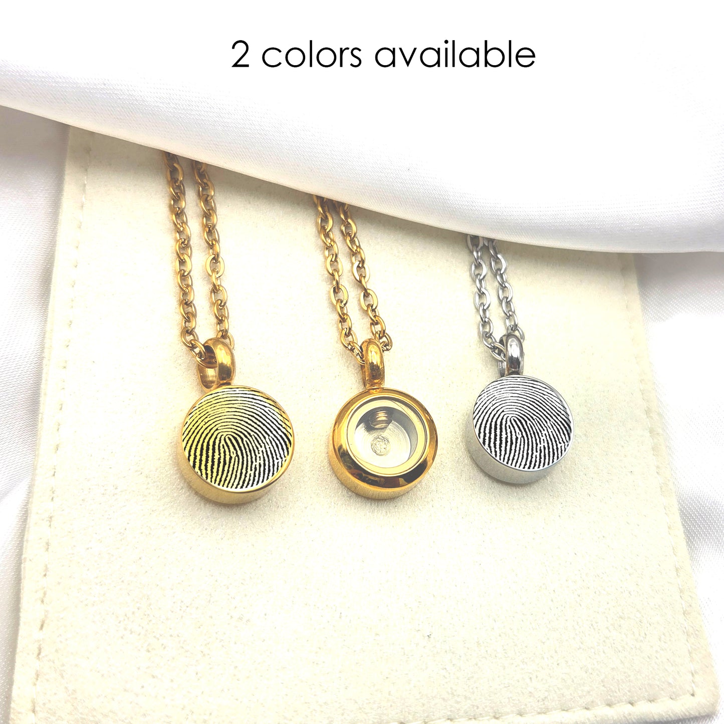 Memorial thumbprint urn necklace for human ashes.