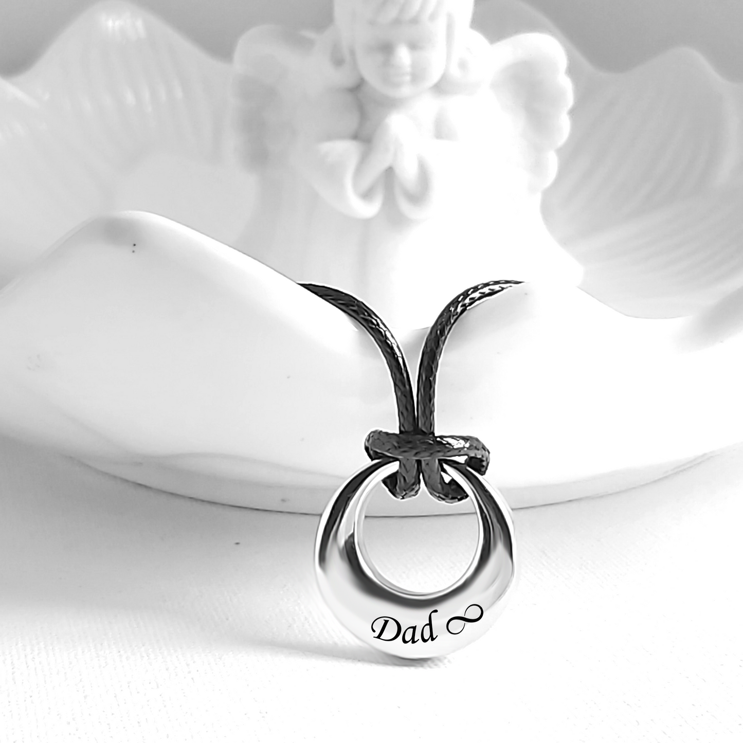 Personalized cremation infinity urn necklace for ashes.