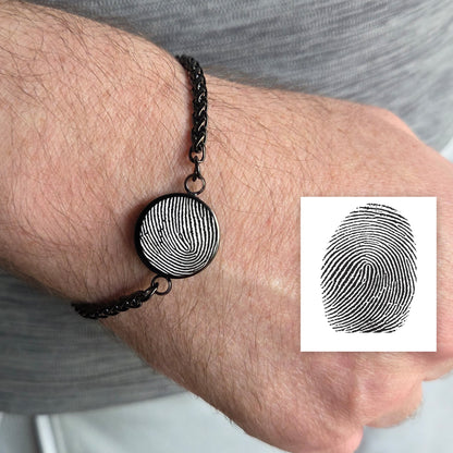 Thumbprint round urn bracelet for ashes.