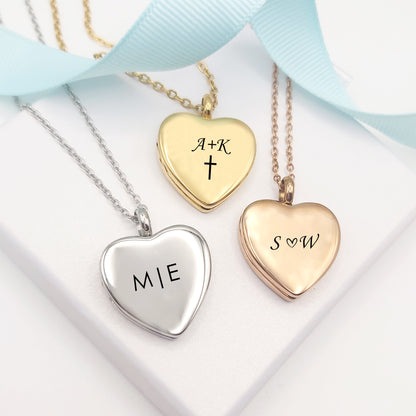 Anniversary locket with engraving and photos for her.