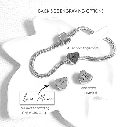 Engraved thumbprint heart charm for bracelet.