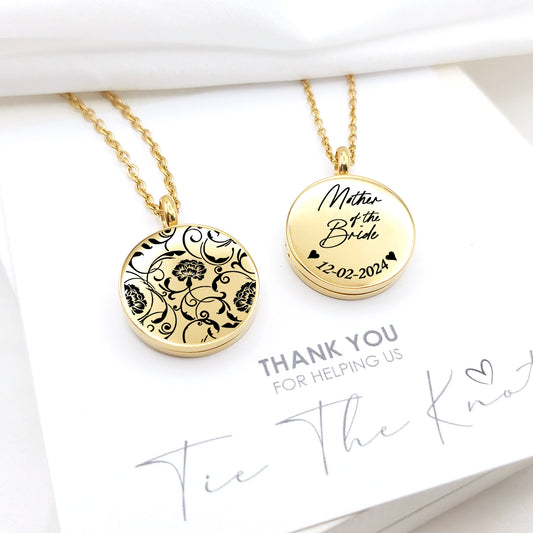 Personalized wedding locket with birth flower for bridesmaids.