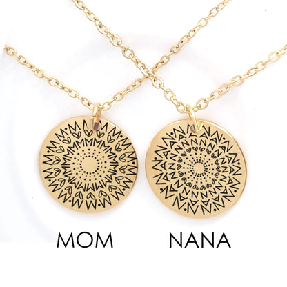 Two gold necklaces with mandala designs labeled 'Mom' and 'Nana' on a white background.