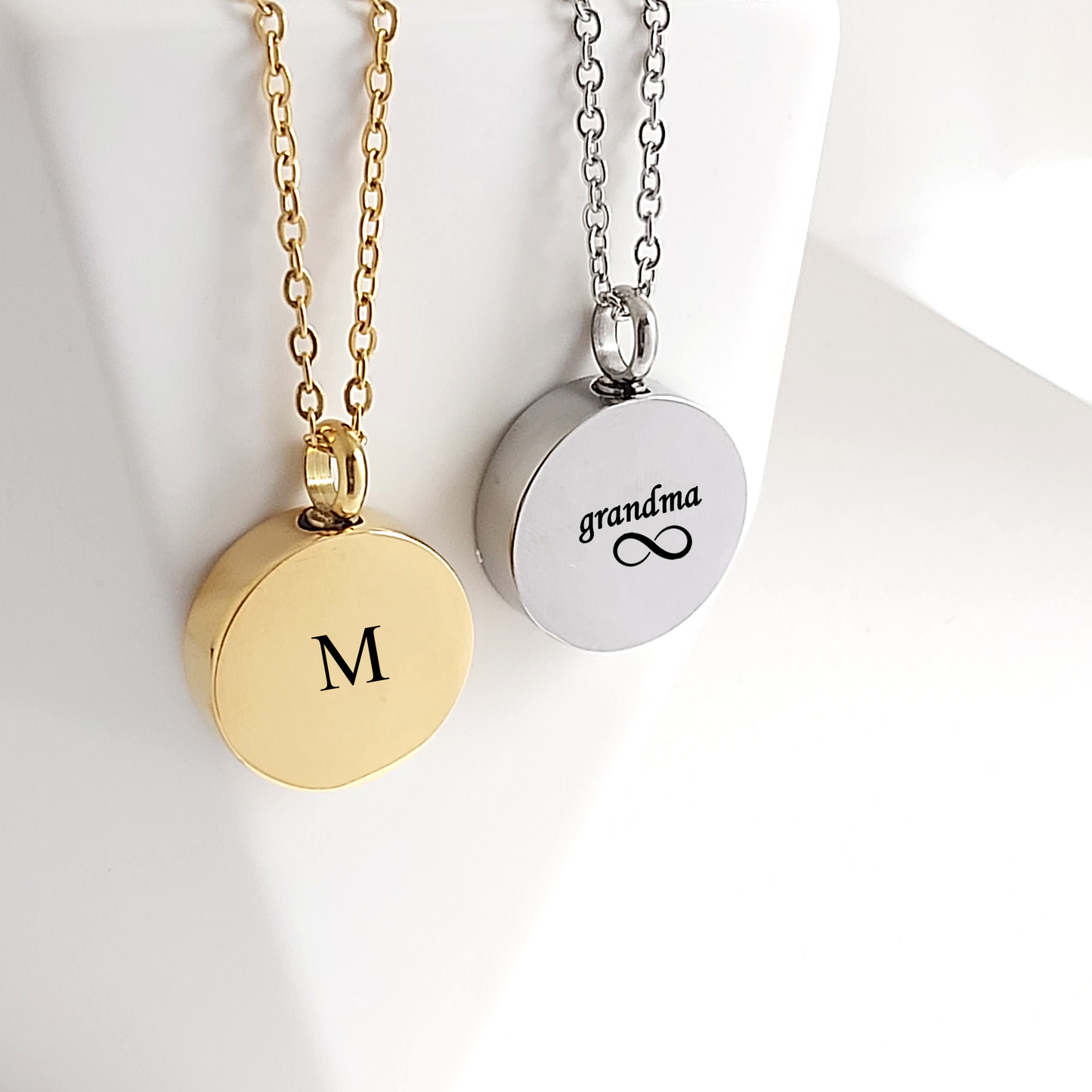 Engraved cremation round urn necklace for ashes.