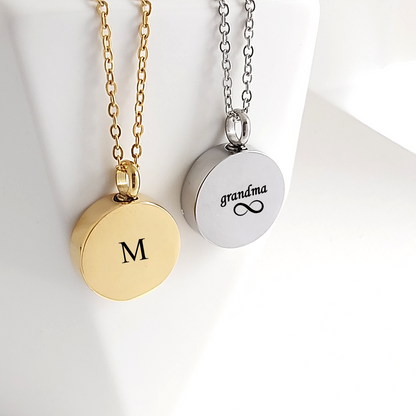 Engraved cremation round urn necklace for ashes.