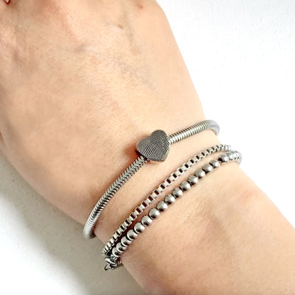 Engraved thumbprint heart charm for bracelet.