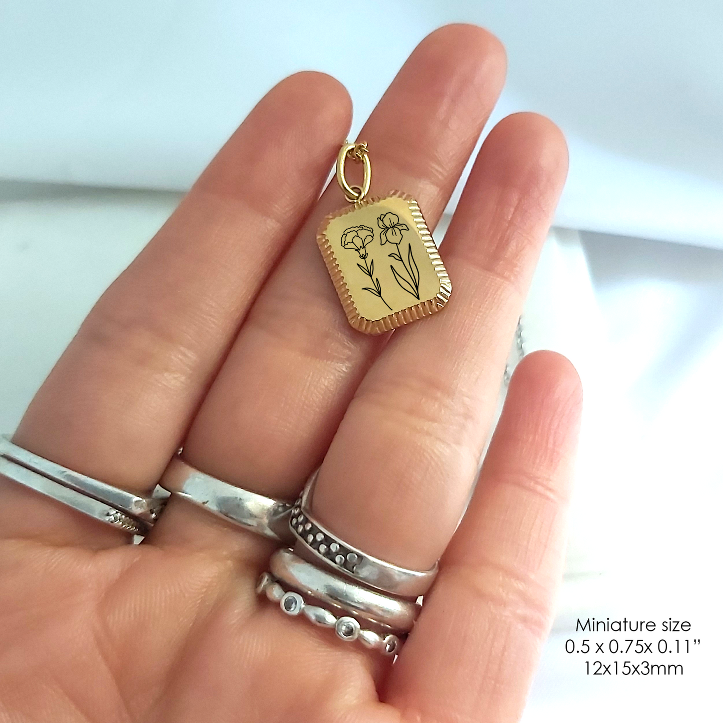 Personalized combined birth flower necklace.