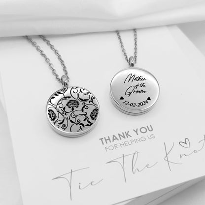 Personalized wedding locket with birth flower for bridesmaids.