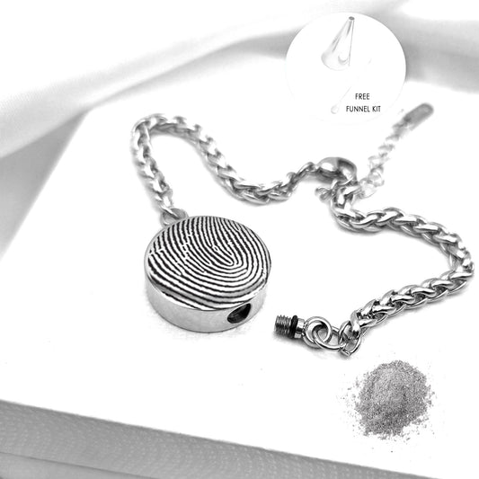 Thumbprint round urn bracelet for ashes.
