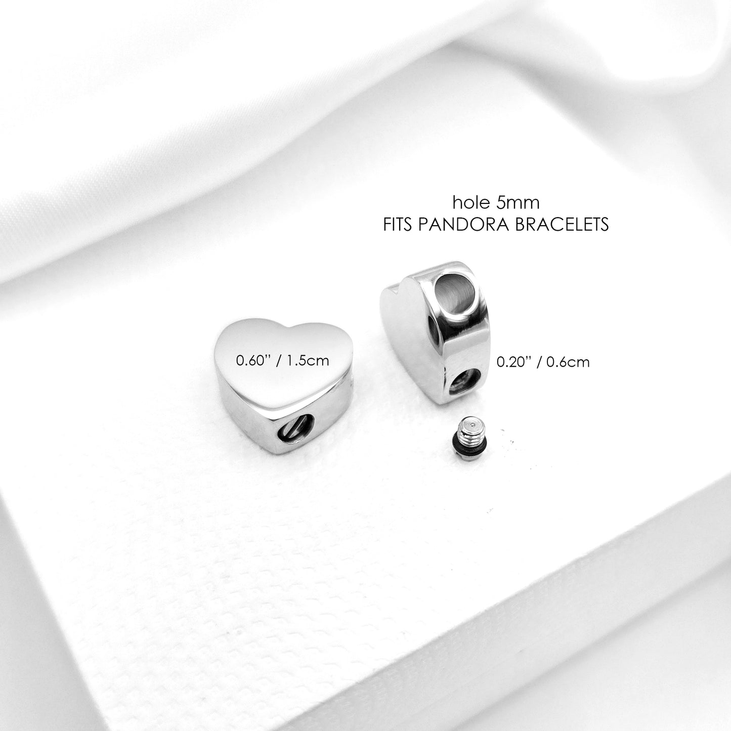 Engraved cremation heart urn charm for bracelet for ashes.