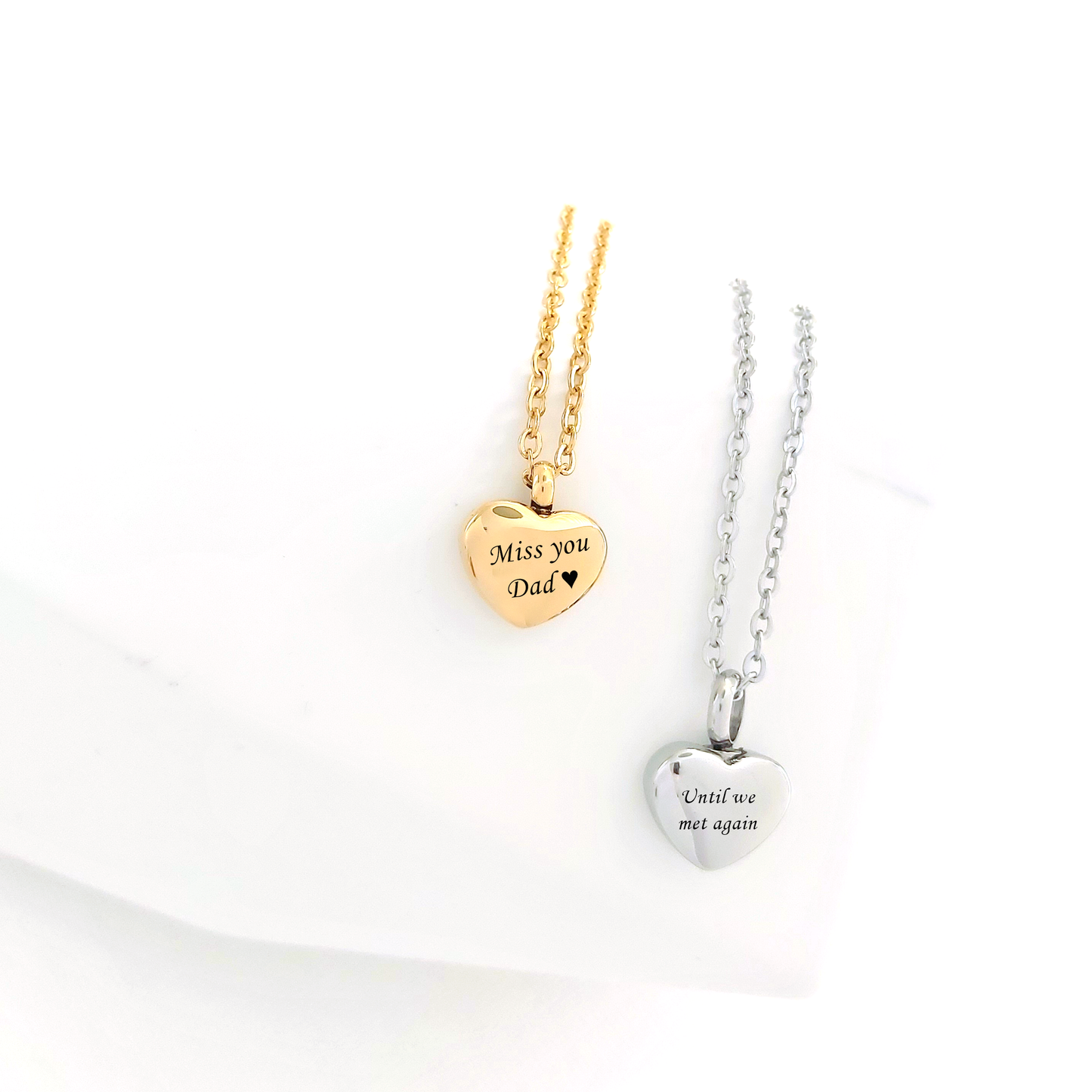 Engraved cremation heart urn necklace for ashes.