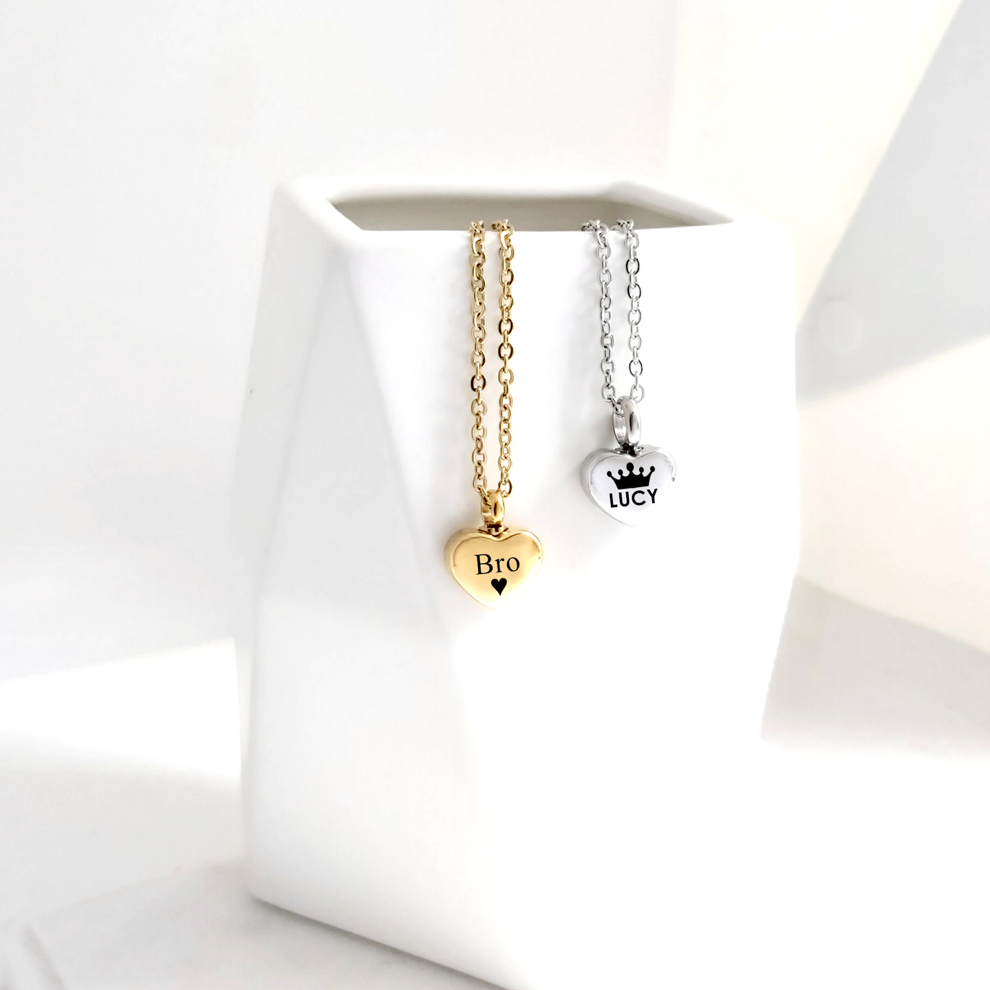 Engraved cremation heart urn necklace for ashes.