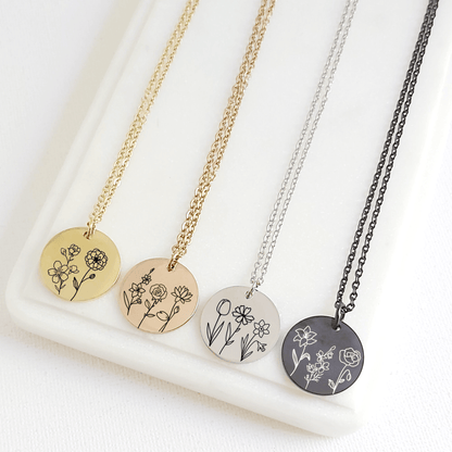 coin necklace engraved with up to three birth flowers