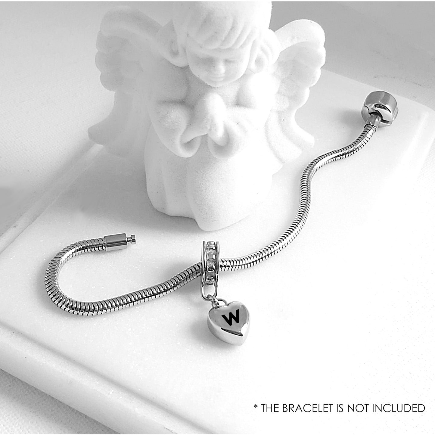 Custom cremation dangling heart urn charm for bracelet for ashes.