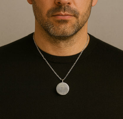 Actual thumbprint urn necklace for human ashes.