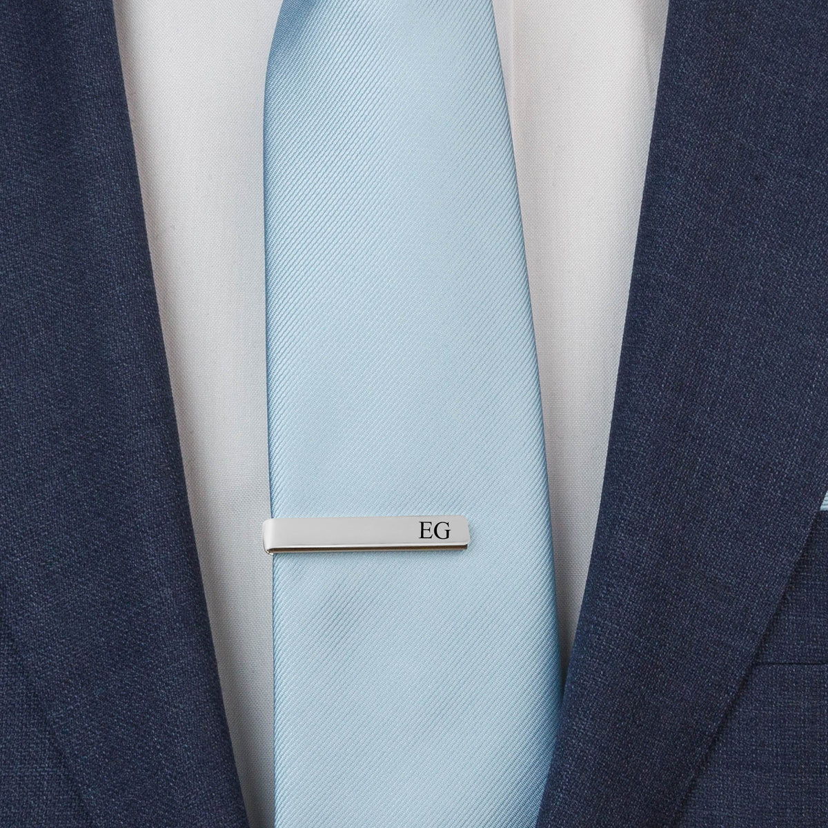 Personalized stainless steel tie clip, laser engraved with a name, date or message.