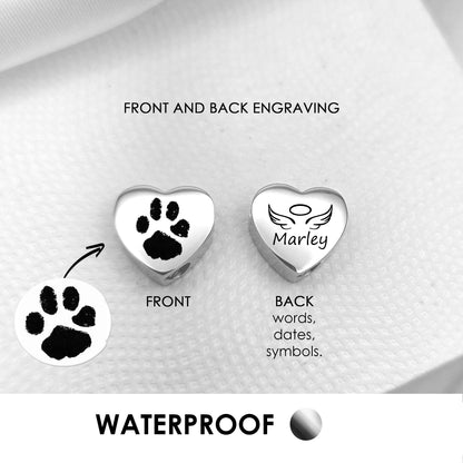 Your pet paw print heart urn charm for bracelet for ashes.