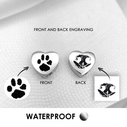 Your pet paw print heart urn charm for bracelet for ashes.