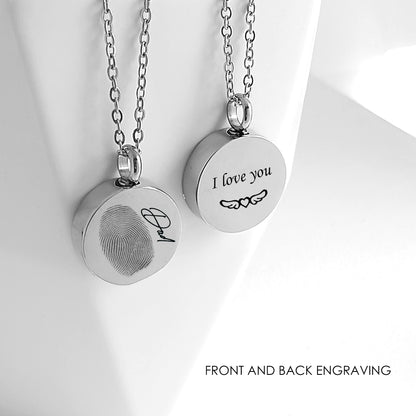 Custom thumbprint urn necklace for human ashes.