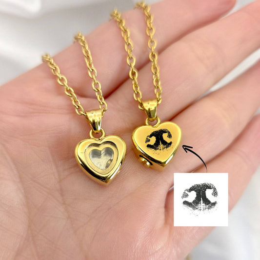 Actual paw print cremation heart urn necklace for ashes or hair. - mobimomentos