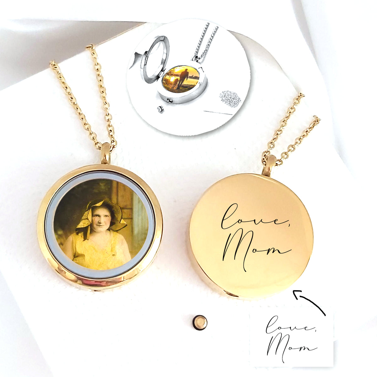 Two polished gold-tone round locket necklaces on a white background. One open locket displays a vintage portrait, while the closed locket is engraved with the handwritten words “Love, Mom.” A small circular inset shows a silver photo locket, chain, funnel, and tiny spoon used for filling the urn compartment.