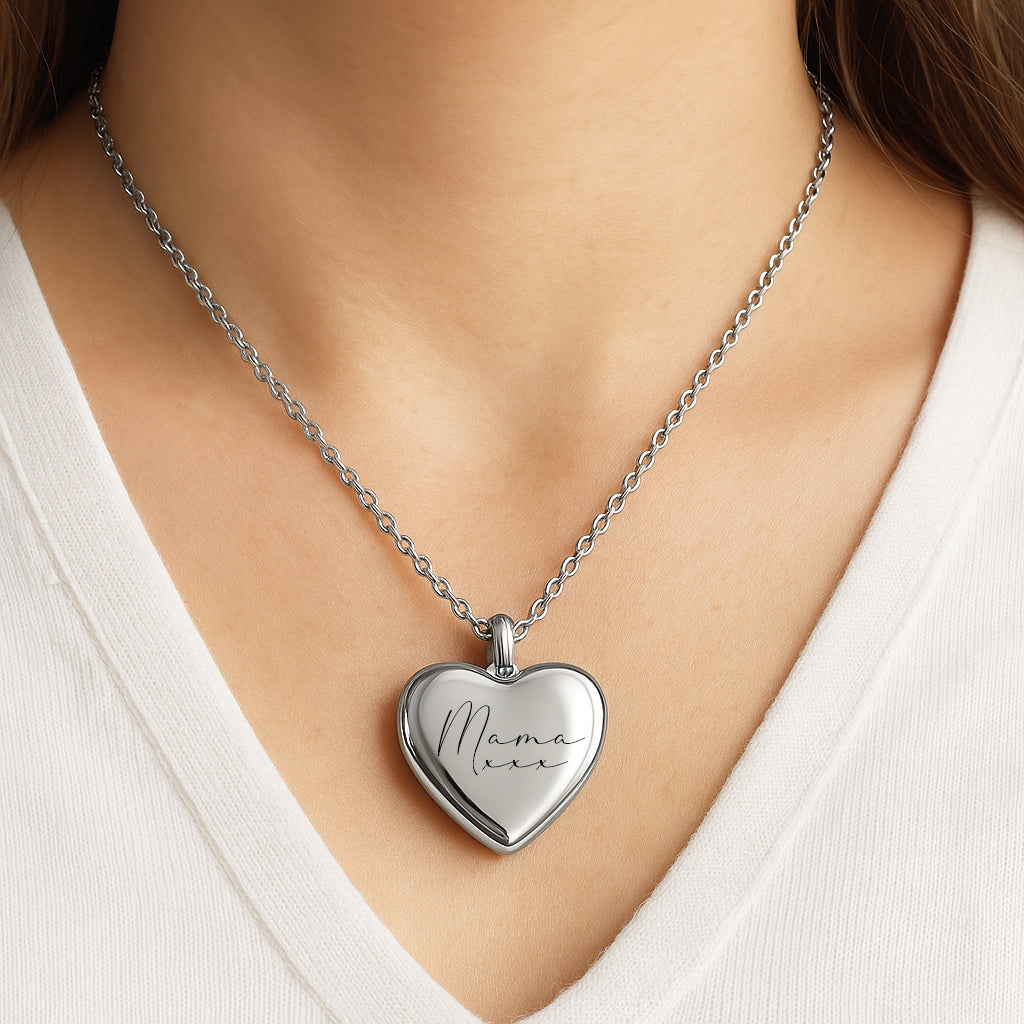 Handwriting and signature heart locket with photos.