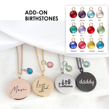 Locket engraved with kids drawings.