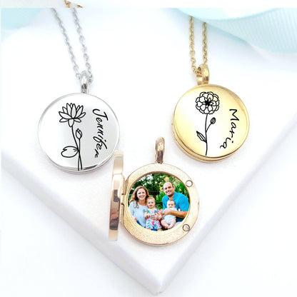 Three necklaces with engraved names and a family photo on a white background