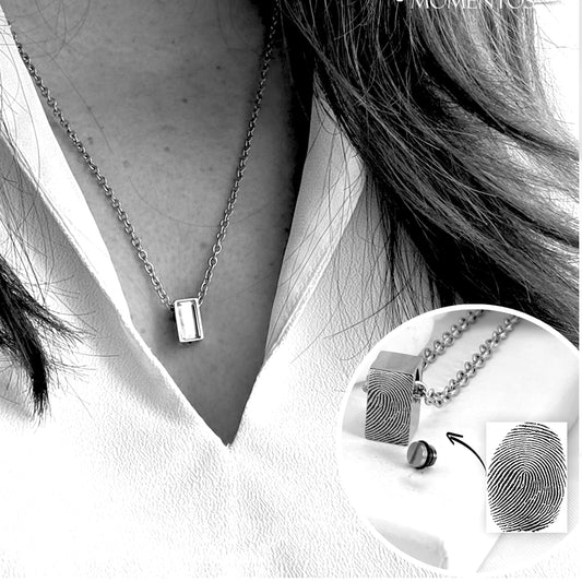 Custom thumbprint mini urn necklace for human ashes.