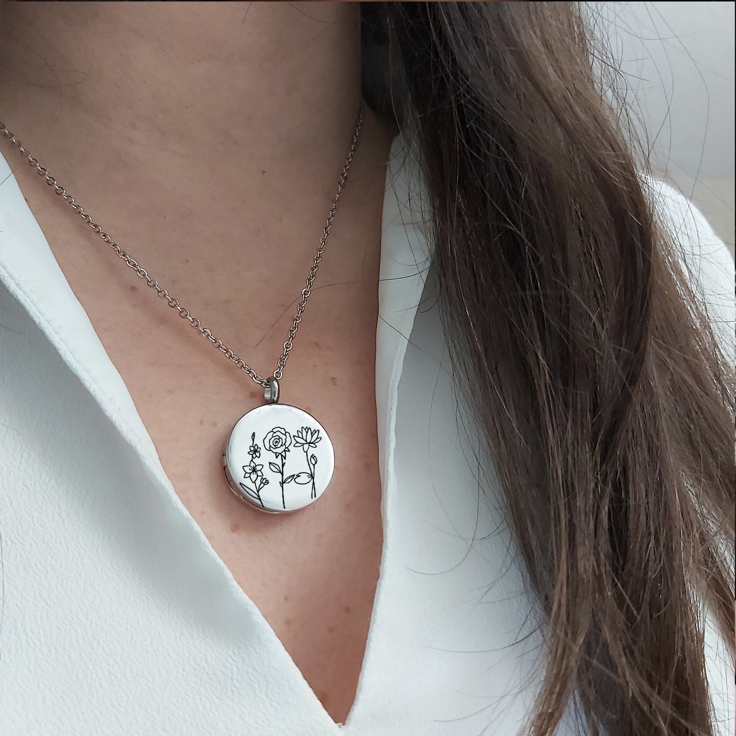 Personalized locket engraved with birth flowers for woman