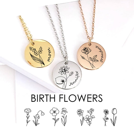 Three necklaces with circular pendants featuring floral designs and names on a white background.