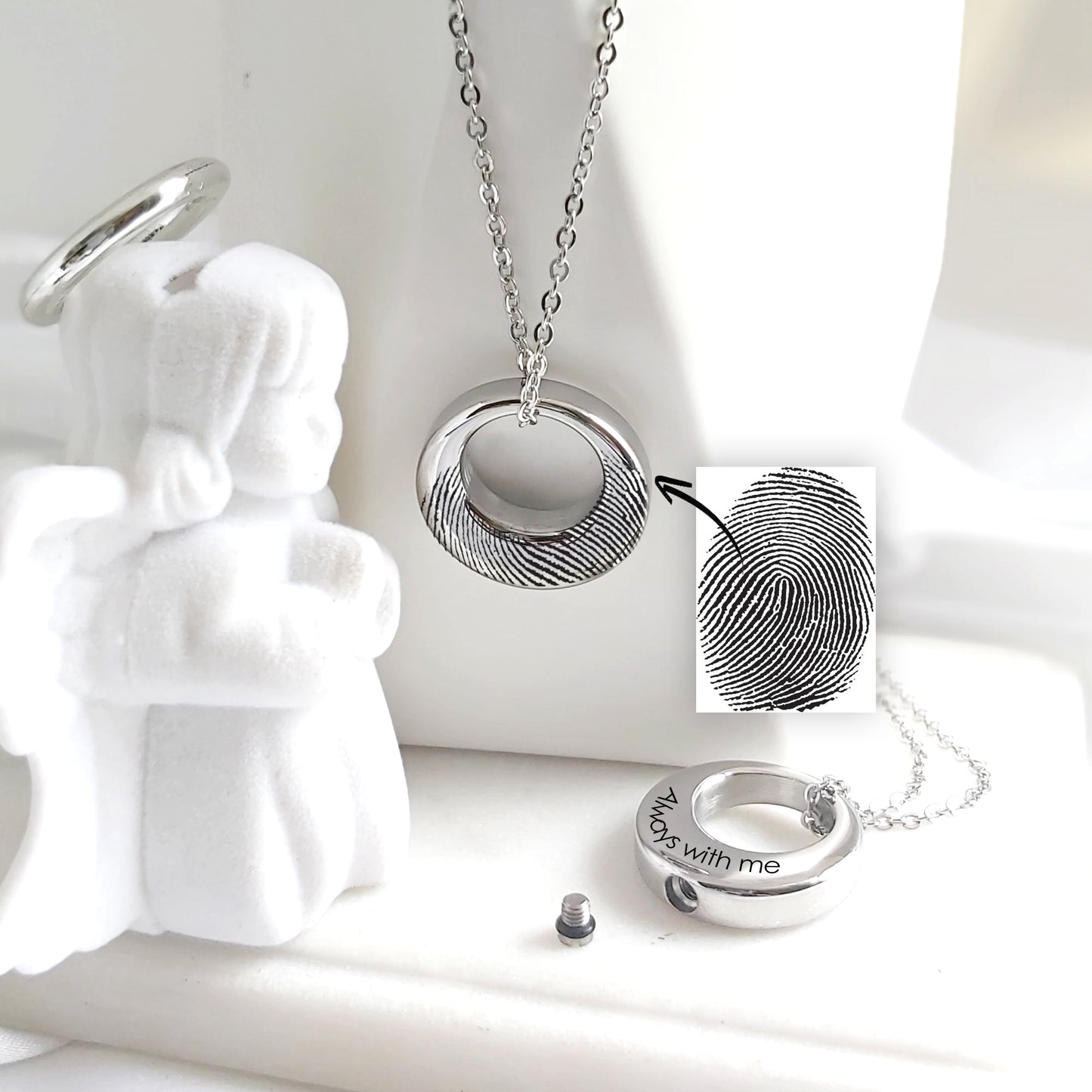 Custom thumbprint Infinity urn necklace for human ashes.