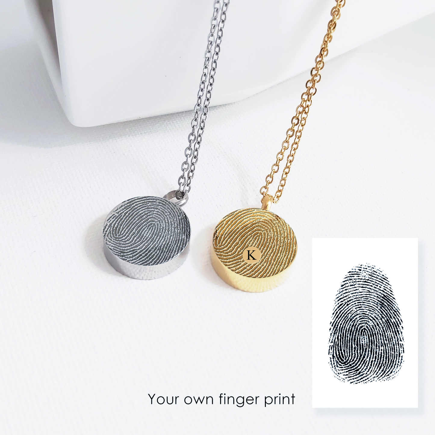 Actual thumbprint urn necklace for human ashes.
