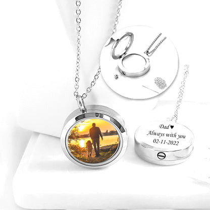 Memorial locket with photos and urn for ashes.